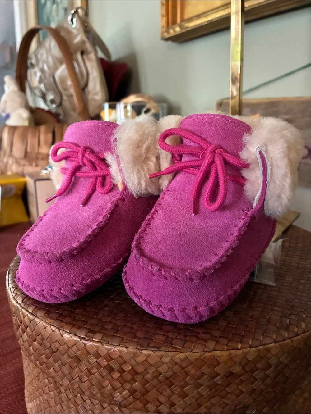 UGG Sparrow Infant Booties feature soft suede uppers with cozy suede & shearling